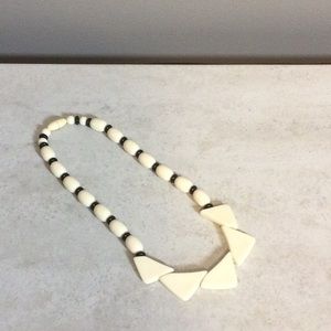 8.5” ivory and black beaded necklace